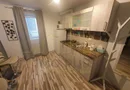 Casa + 5 apartamente + spatiu de inchiriat + parcari. Pretabil locuit + afacere