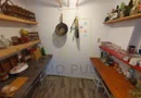 Casa individuala pe parter, cu pod foarte inalt amenajat.