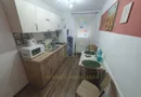 Casa + 5 apartamente + spatiu de inchiriat + parcari. Pretabil locuit + afacere