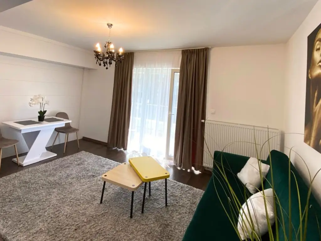 Apartament modern cu 2 camere pereți retractabili terasă parcare și boxă