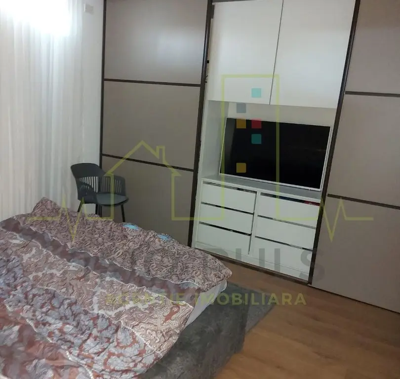 Apartament pe 3 nivele. Terasa 30 mp. 2 Balcoane. 2 Bai. Gradina