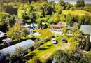 O proprietate de exceptie la Corbi, 18 ha, izvor, lac, pastravarie