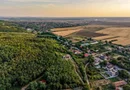 Teren pe deal, 1.150 mp, în Miniș, front 26 m, Drumul Vinului