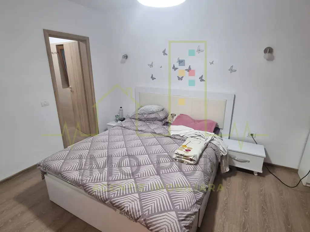 4 Camere. Mobilat si utilat. Drum asfaltat.