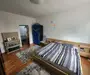 Apartament cu curte. Teren 636 mp.