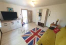 Casa individuala pe parter, cu pod foarte inalt amenajat.