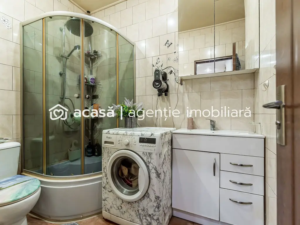 Apartament în centru cu acces auto și garaj propriu