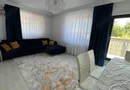 Casă 3 camere 2 băi și curte 75 mp finisată și mobilată lux