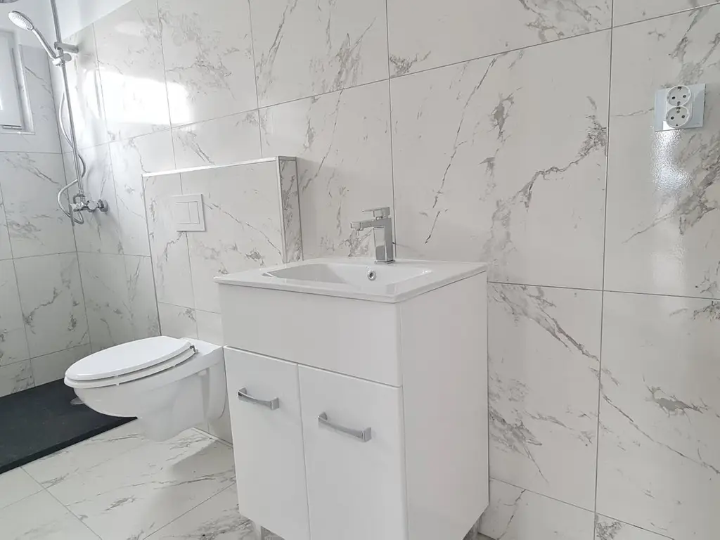 Casa 4 camere un nivel finalizata intabulata cartier Izvor Tarlungeni