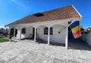 Casa perfectă pentru familie – curte, foișor cu grătar și garaj triplu