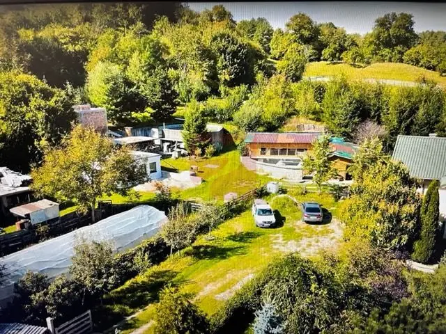 O proprietate de exceptie la Corbi, 18 ha, izvor, lac, pastravarie