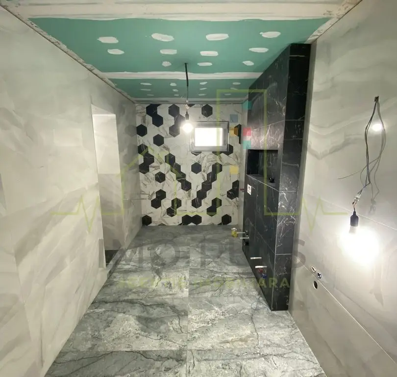 Casa individuala. 660 Teren. Ghiroda. Carport.
