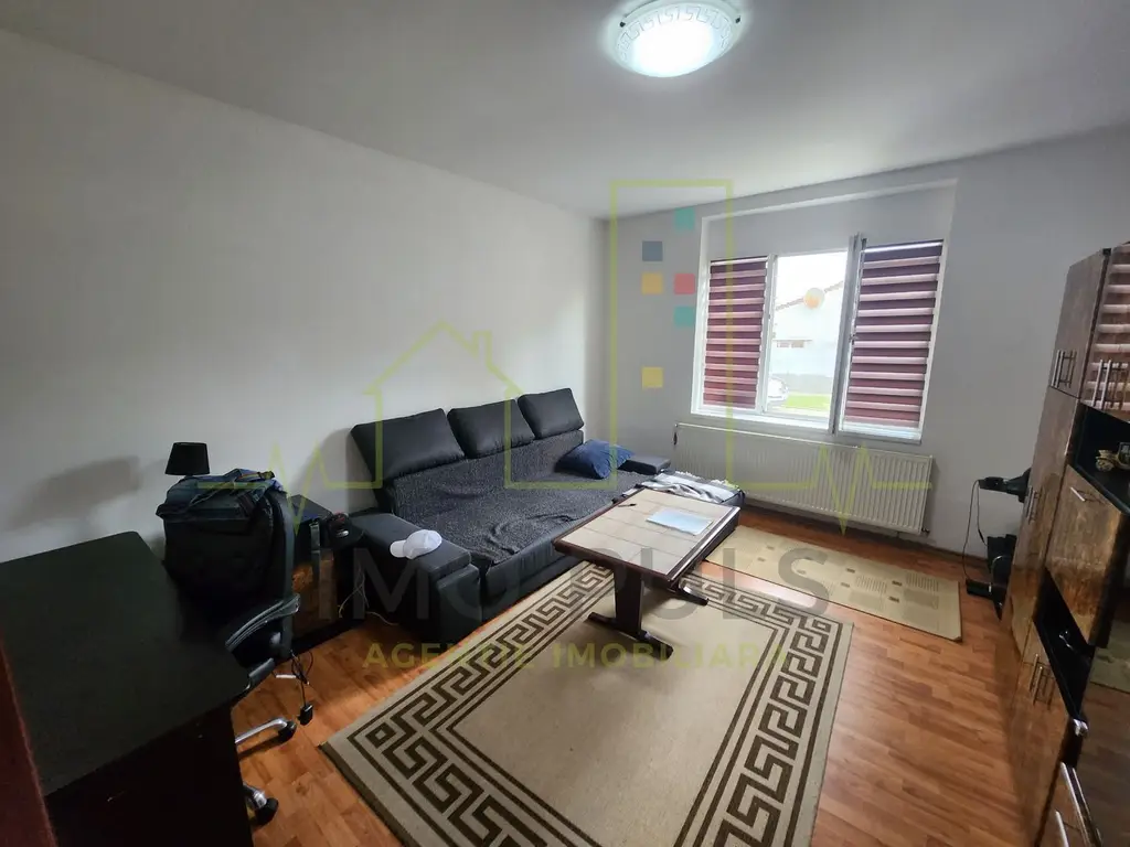 Apartament cu curte. Teren 636 mp.