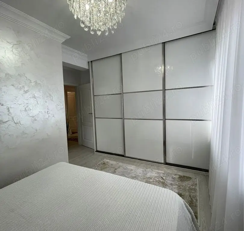 Casă 3 camere 2 băi și curte 75 mp finisată și mobilată lux
