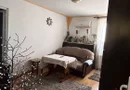 BRASADAS vinde casă cu etaj 8 cam 8 ari zona BOTIZULUI.