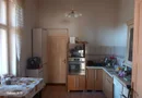 Ag BRASADAS vinde casa 4 camere cu teren 8 ari in zona CENTRALA.