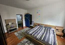 Apartament cu curte. Teren 636 mp.