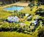 O proprietate de exceptie la Corbi, 18 ha, izvor, lac, pastravarie