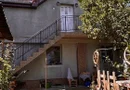 BRASADAS vinde casă cu etaj 8 cam 8 ari zona BOTIZULUI.